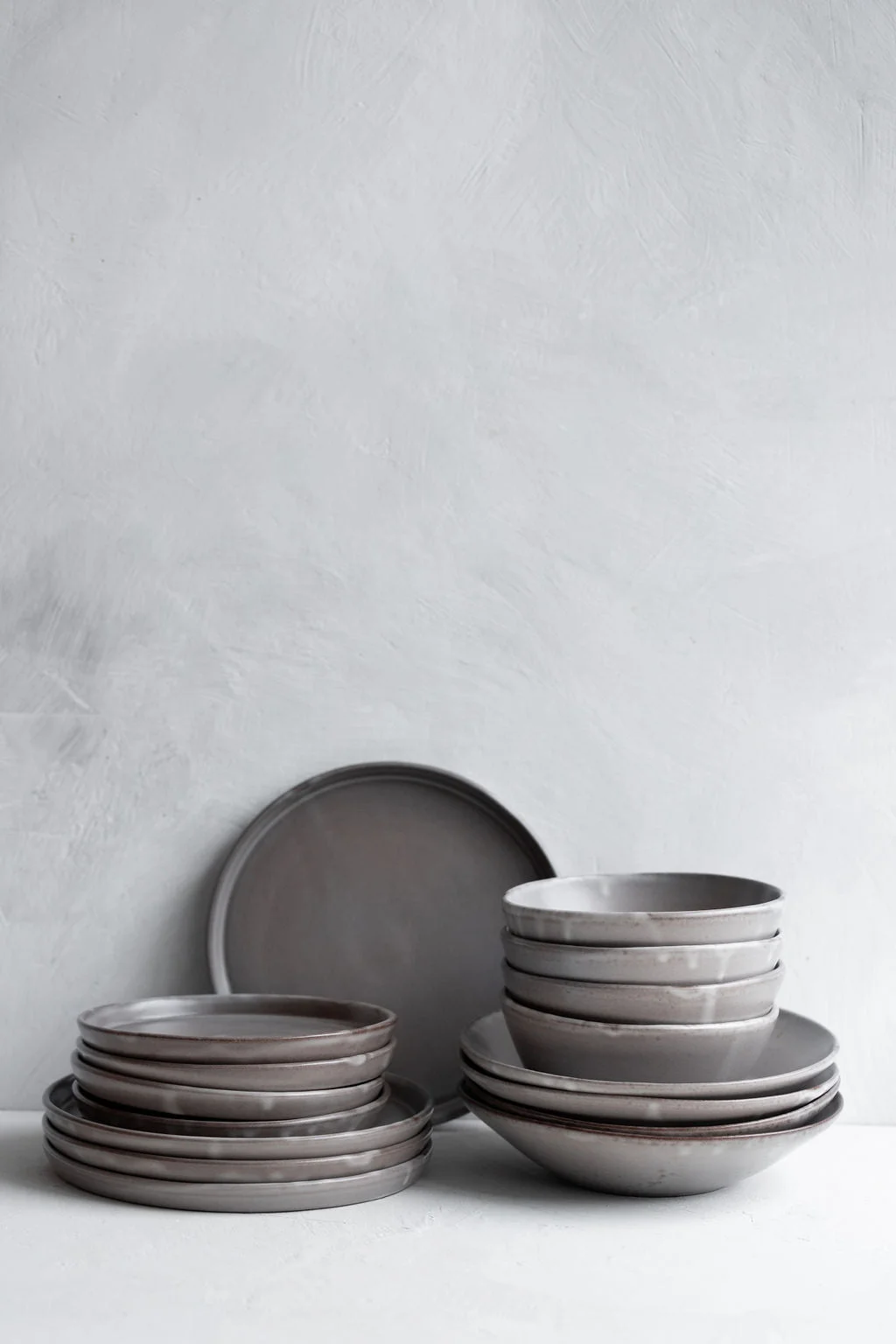 Notary Satin Stone Dinnerware Set by Notary Ceramics